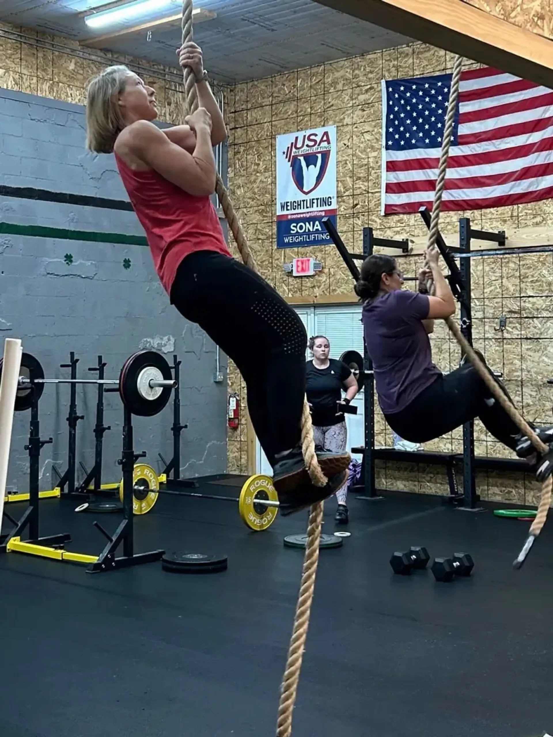CrossFit SONA members practising rope climbs at the gym